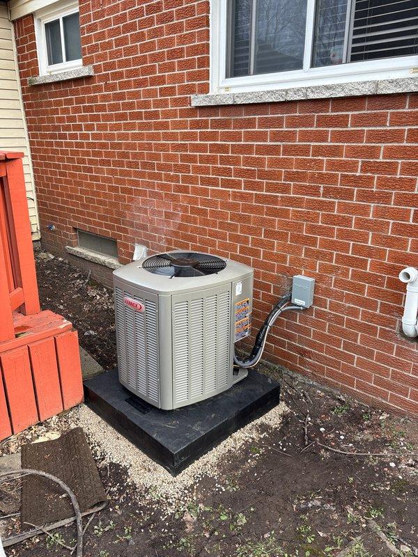 Completed full HVAC system installation including a 70,000 BTU furnace, 2-ton air conditioning unit with rear discharge configuration, humidifier, liner, and APCO air purification system. Installed outdoor condensing unit on raised platform with proper electrical disconnect and conduit routing. Performed system startup, charged refrigerant lines using R454B refrigerant to manufacturer specifications with pressures verified at 176.3 psia low side and 185.3 psia high side. Reconnected all existing ductwork, installed 4x25 vent configuration, and verified proper airflow throughout system. Submitted permit documentation and utility rebate applications for Consumers Energy ($350) and DTE ($150). System tested and operational with AHRI certification number 215566314 confirmed for equipment matching.