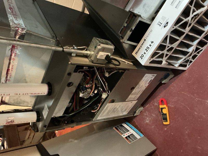 Completed comprehensive spring maintenance on 10-year-old air conditioning system located on west side of property. Performed full AC tune-up including inspection of outdoor condensing unit electrical components, capacitor testing, contactor examination, and control board verification. Inspected indoor air handler unit, confirmed 20x25x4 filter specifications for Mitsubishi system, checked electrical connections and wiring integrity throughout system, and utilized diagnostic meters to verify proper amperage draws and system performance. All components found operational and system ready for cooling season.