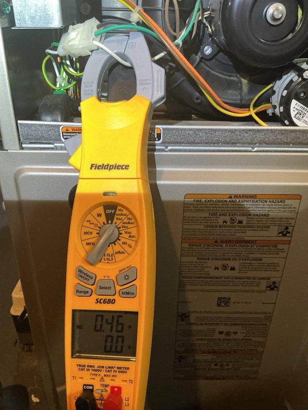 Responded to no heat call on 4-year-old furnace located in basement. Performed diagnostic testing using clamp meter to measure electrical parameters and amperage draw on blower motor and system components. Identified failed inducer assembly as cause of no heat condition. Ordered replacement inducer assembly under PO 1308208-001 for installation, which is currently available at branch location for pickup and completion of repair.