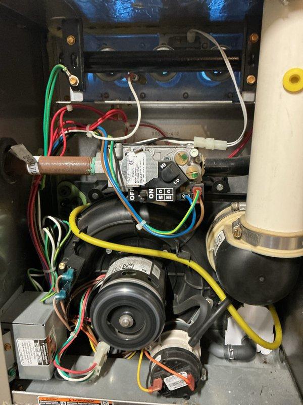 Completed comprehensive tune-up on 9-year-old gas furnace located in basement. Performed full system inspection including burner assembly, heat exchanger, gas valve, draft inducer motor, and all electrical connections. Verified AprilAire air purifier filter (models 2200/2250) was properly installed and functioning. All components operating within normal parameters with no issues identified at time of service.