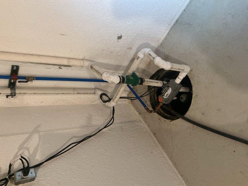 Responded to service call regarding sump pump running excessively with backup pump activating. Upon arrival, performed diagnostic inspection of primary and backup sump pump system including float switches, check valves, and discharge piping. Evaluated ceiling-mounted discharge line configuration with PVC piping, check valve assembly, and electrical connections to both pumps. Assessed system operation, pump cycling frequency, and backup pump engagement. Identified issue causing extended runtime and provided recommendations to restore proper primary pump function and prevent unnecessary backup pump activation.