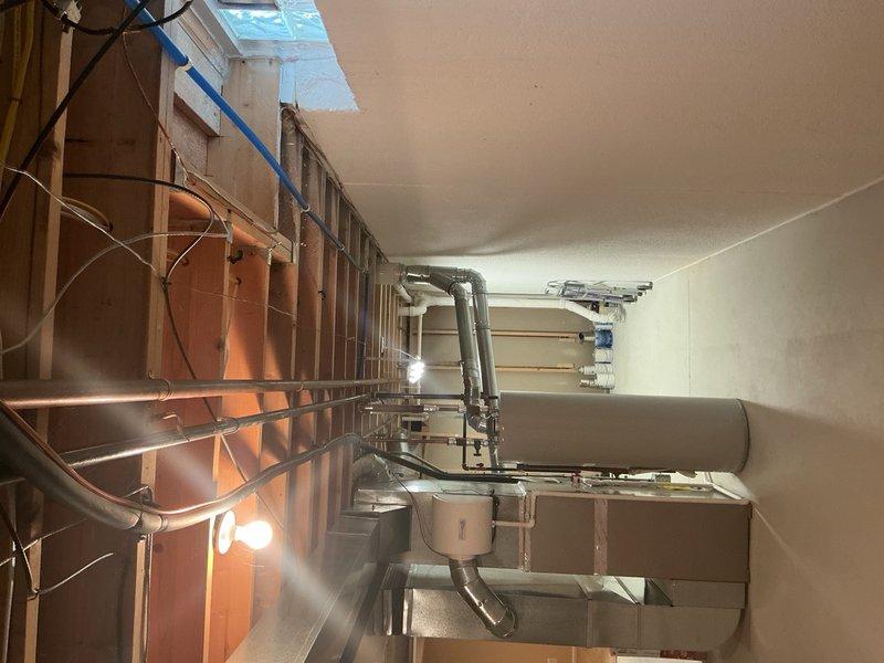 Responded to service call regarding sump pump running excessively with backup pump activating. Upon arrival, performed diagnostic inspection of primary and backup sump pump system including float switches, check valves, and discharge piping. Evaluated ceiling-mounted discharge line configuration with PVC piping, check valve assembly, and electrical connections to both pumps. Assessed system operation, pump cycling frequency, and backup pump engagement. Identified issue causing extended runtime and provided recommendations to restore proper primary pump function and prevent unnecessary backup pump activation.