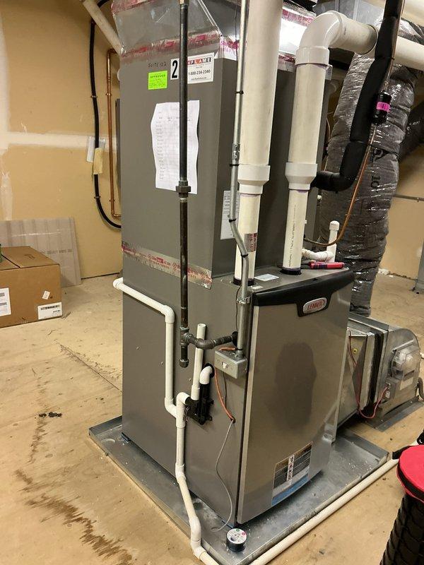 Completed spring maintenance on eight commercial HVAC units located in attic space during standard business hours. Performed comprehensive preventive maintenance inspections on all systems, including Lennox furnace units and air handler equipment with Trion Air Bear filtration systems. Documented equipment conditions with photography, verified proper operation of all mechanical components, checked refrigerant levels, inspected condensate drain lines and PVC venting systems, and confirmed all units were functioning within manufacturer specifications.