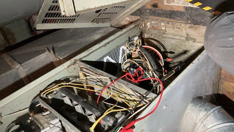 Responded to no-heat call and performed diagnostic inspection of furnace system located in attic space. Upon arrival, accessed air handler unit and inspected internal components including blower motors, electrical connections, and evaporator coil assembly. Documented existing conditions showing dust accumulation on equipment surfaces and evaluated wiring connections and system components to determine cause of heating failure.