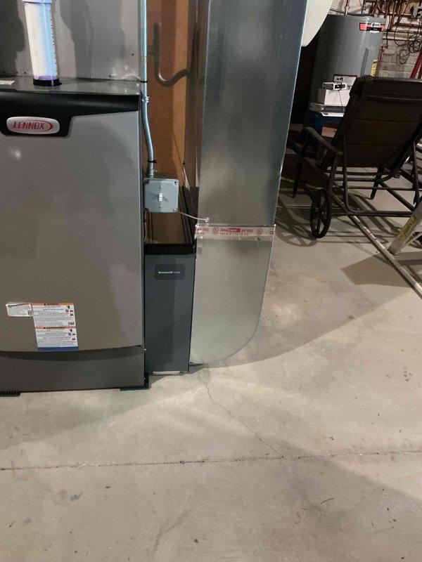 Installed Lennox 110,000 BTU furnace in basement utility area with complete electrical reconnection and ductwork integration. Submitted permit requests for mechanical, electrical, and furnace work, and processed utility rebate application. All systems tested and operational upon completion.