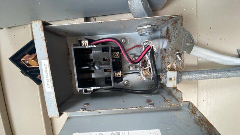 Completed installation of 2.5 ton Unico air conditioning system including new condenser unit and evaporator coil at rear of residence. Performed system flush, installed wet switch, and reconnected all electrical connections including contactor wiring at exterior disconnect box. Mechanical and AC permit requested for installation work.