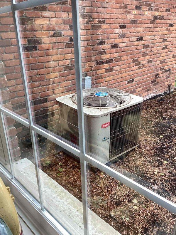 Responded to service call for non-operational furnace located in basement. Performed diagnostic assessment and identified failed inducer motor as root cause of system failure. Evaluated existing HVAC system including outdoor condensing unit and indoor furnace equipment to determine age and condition. Prepared comprehensive replacement estimate for complete system upgrade due to age of equipment and cost-effectiveness analysis comparing repair versus replacement options. Documented equipment conditions through photography of outdoor condenser unit and basement furnace area for estimate records.