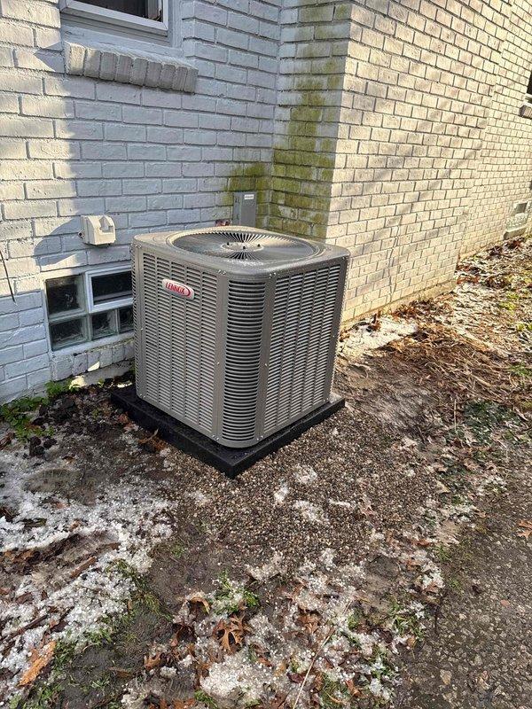 Successfully completed installation of a 2.5-ton Lennox air conditioning system with evaporator coil positioned on the right side of the residence. The outdoor condensing unit was mounted on a composite pad against the exterior brick wall, with proper clearances maintained for airflow and serviceability. All electrical connections were completed, including disconnect box installation. The system was integrated with the existing humidifier and reconnected to the ductwork. Mechanical, electrical, and air conditioning permits were secured prior to installation. All required documentation was processed and identification verification completed. The unit was tested for proper operation, refrigerant charge verified, and system commissioned successfully.