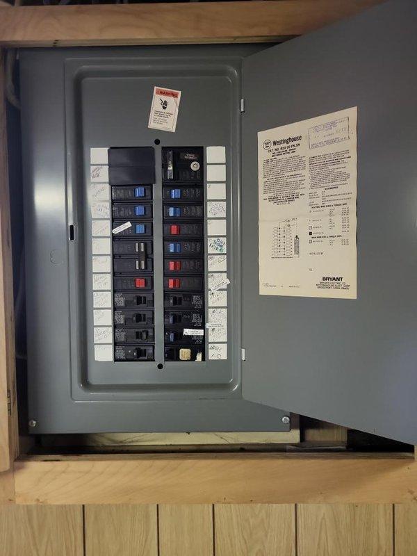 Responded to service call for furnace not turning on in basement location. Upon inspection, found 2002 model furnace over 10 years old showing signs of failure. Evaluated existing HVAC system including electrical panel connections, ductwork configuration, and auxiliary components including humidifier. Documented current installation with metallic flexible ductwork, PVC condensate drain lines, and existing circuit breaker setup. Prepared comprehensive replacement estimate for new furnace system to restore heating functionality to residence.