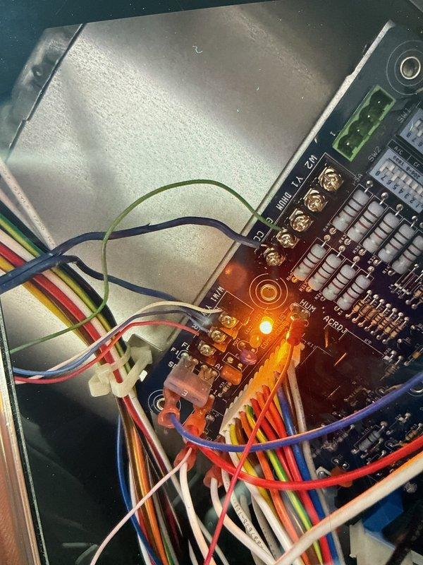 Responded to service call for bedroom thermostat continuously running furnace and causing overheating condition on 6-year-old unit. Inspected Honeywell thermostat wiring and terminal connections, verified proper wire placement at R, RC, W, Y, G, and B terminals. Examined furnace control board, confirmed LED status indicator functioning and all low-voltage wiring connections secure at terminal blocks. Identified thermostat malfunction causing continuous call for heat, preventing furnace from cycling properly. Corrected wiring configuration and tested system operation to ensure proper heating cycles and temperature control restored.