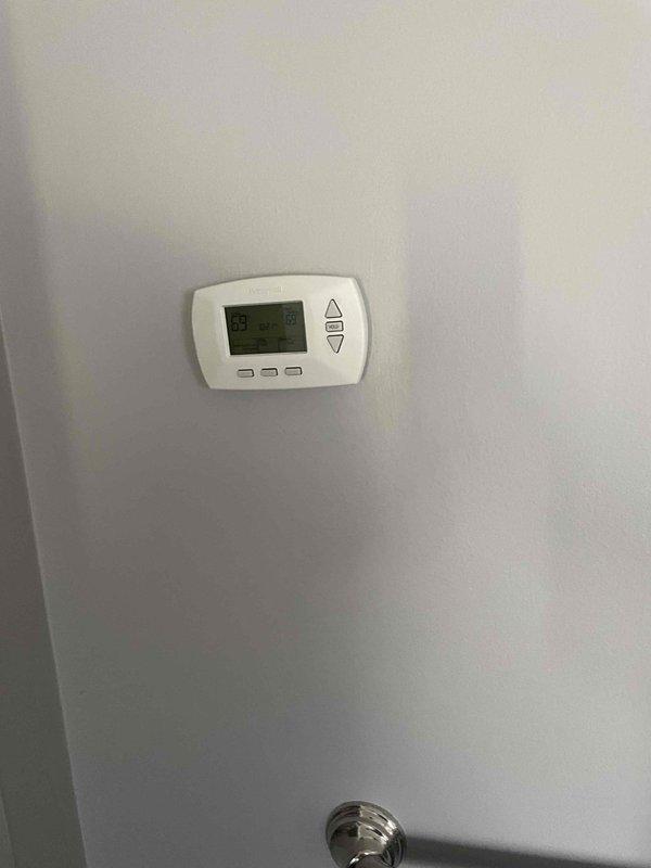 Conducted comprehensive assessment of existing HVAC system and water heater for replacement quote. Evaluated current furnace, air conditioning unit, and water heater installation, documenting equipment specifications, configurations, and spatial requirements. Photographed thermostat, heating and cooling equipment, and water heater to provide accurate replacement recommendations for complete system upgrade.