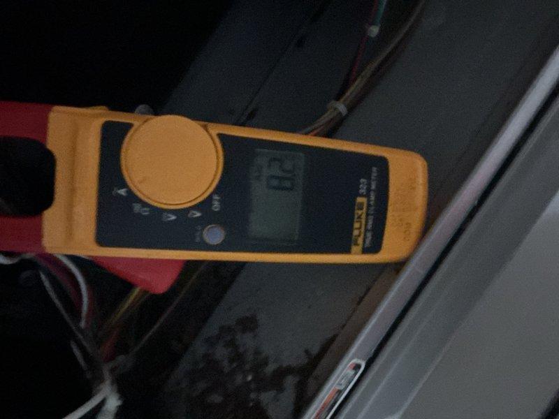 Completed comprehensive AC tune-up on outdoor unit per DTE recommendation. Performed full system diagnostic including electrical testing with digital multimeter and clamp meter to verify proper amperage draw and voltage levels at compressor and electrical components. Inspected all electrical connections, tested capacitor functionality, and confirmed system operating within manufacturer specifications. Unit found to be functioning properly with no immediate service needs identified. All readings documented and system cleared for continued operation.
