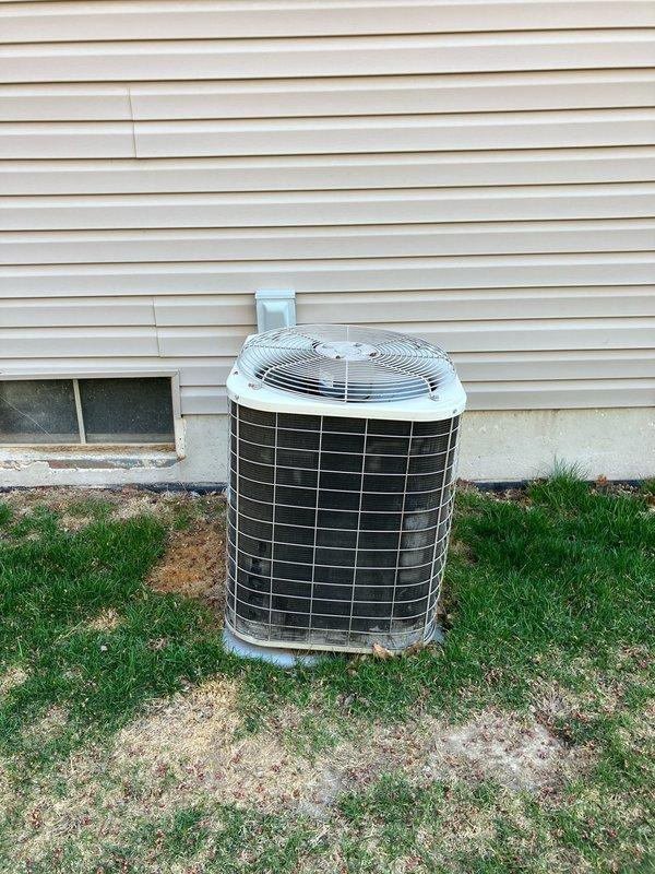 Conducted full system estimate for replacement of 24-year-old original equipment including furnace and air conditioning system. Evaluated existing outdoor condenser unit installed on concrete pad with standard refrigerant line configuration and electrical disconnect. Documented current system specifications and provided comprehensive replacement quote for complete HVAC system upgrade.