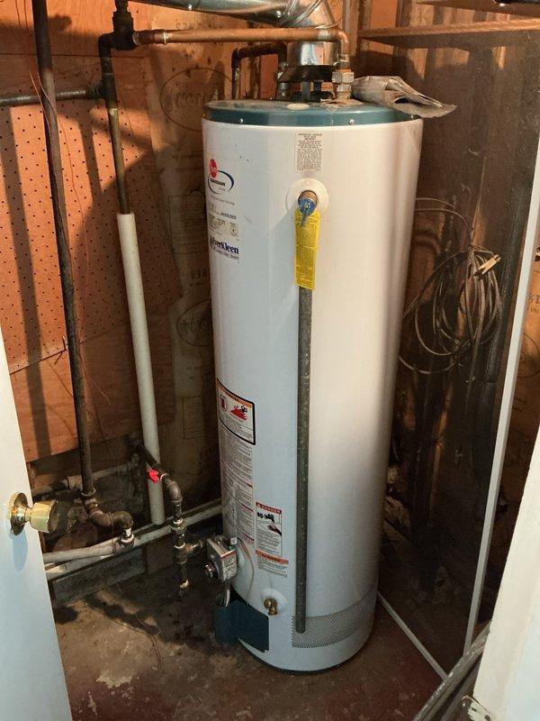 Completed water meter repair and replacement service. Removed aged meter assembly showing significant corrosion and discoloration on brass fittings and copper piping. Installed new meter with proper connections, ensuring all fittings were secured and system was tested for leaks before completion.