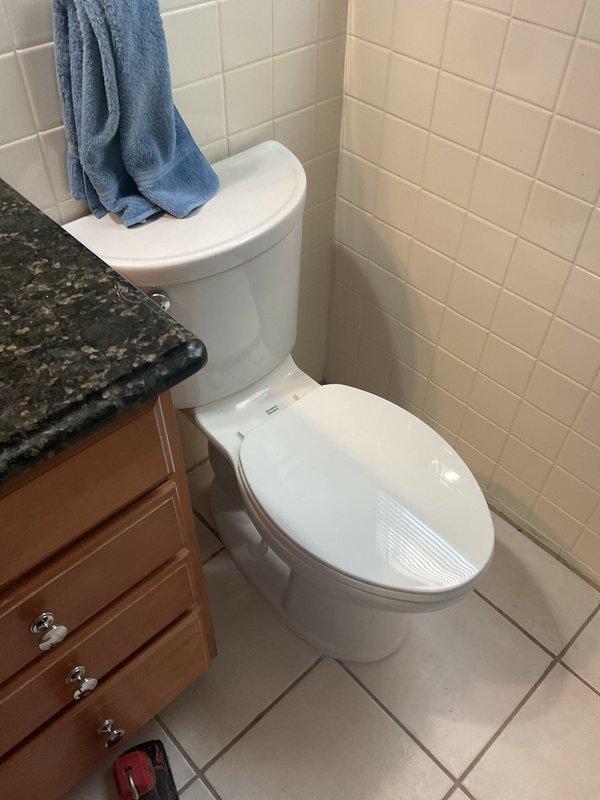 Completed plumbing service call for bathroom fixture maintenance. Inspected undermount sink installation with chrome drain assembly beneath granite vanity countertop, verified proper drainage function and seal integrity. All fixtures operating within normal parameters upon completion of service visit.
