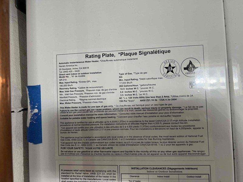 Completed comprehensive tune-up and maintenance service on basement-located heating system including boiler, tanked water heater, and Navien tankless water heater, all over 10 years old. Performed full system inspection, flushed tankless unit to remove mineral buildup and ensure optimal performance, and verified proper operation of burner assembly and pilot components. All equipment tested and confirmed operational upon service completion.