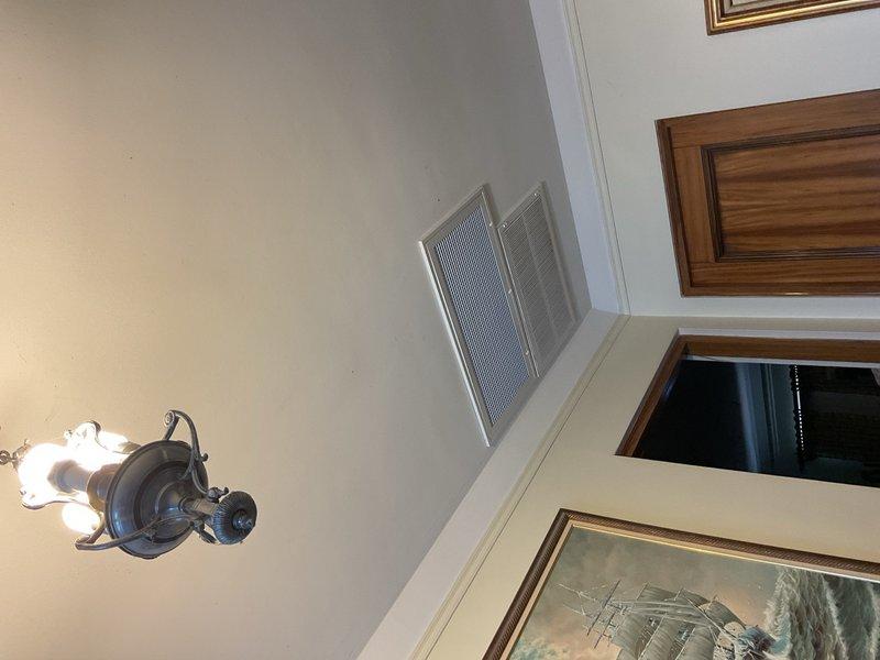 Completed a two-day installation of a 4-ton Unico air conditioning system including a new condenser unit positioned in the rear yard, Unico air handler coil installed in the attic space, and programmable thermostat. Performed system flush to ensure proper refrigerant flow and reconnected all electrical components. Installed new air filtration system with pleated filter, ran flexible ductwork with metallic insulation from the air handler, and mounted necessary control boxes and transformers. Obtained mechanical permit prior to installation and verified all components were properly wired and secured to framing. Conducted final system testing to confirm cooling operation, airflow distribution through existing vent registers, and proper thermostat communication with equipment.