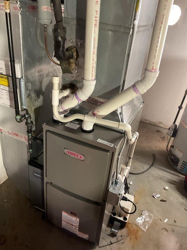 Completed installation of a new 70,000 BTU ECM furnace system with associated thermostat and condensate pump. Obtained mechanical and electrical permits prior to installation and ensured all work met local code requirements. Installed new PVC venting system, established proper electrical connections, configured gas supply lines, and verified all safety controls and operational parameters. System tested and confirmed operational, with utility rebate documentation submitted for energy-efficient equipment.