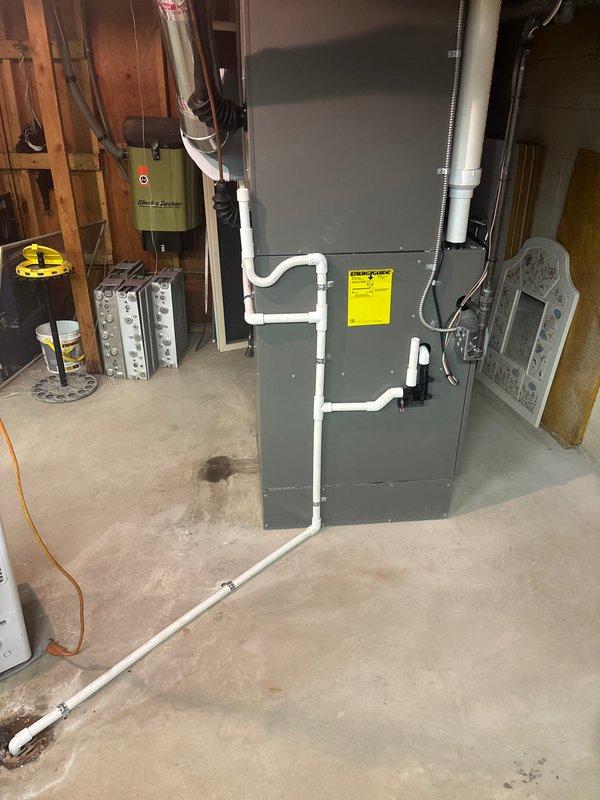 Completed full HVAC system installation including 110,000 BTU furnace with humidifier and 5-ton air conditioning unit with rear discharge configuration. Installed new thermostat, base pan, and 600 CFM ventilation, performed refrigerant line flush, and reconnected electrical components. Obtained mechanical permit, remeasured supply air distribution, verified AHRI certification match (215585783), and confirmed system qualifies for utility rebate program.