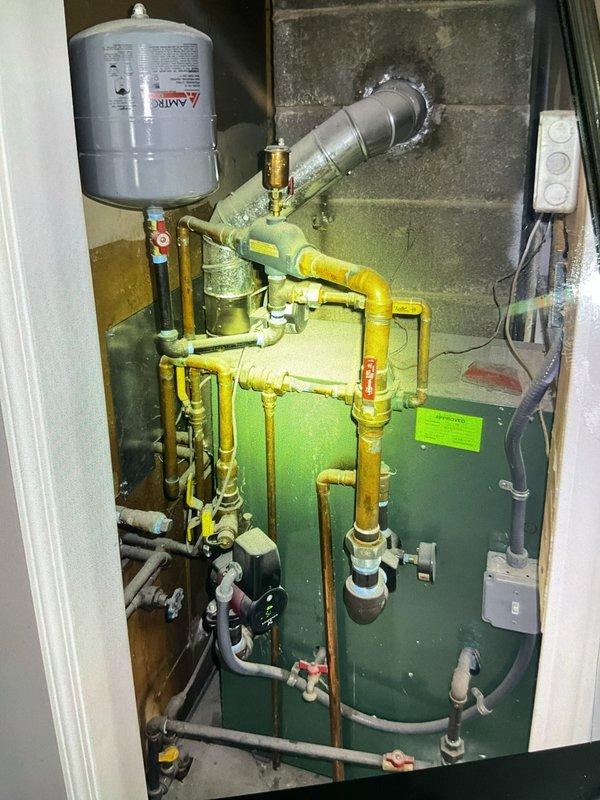 Completed Gold Plan preventative maintenance inspection on 2022 boiler system located in main floor utility room. Performed comprehensive visual inspection of boiler unit, expansion tank, venting system, and all associated piping and connections. Inspected heat exchanger internally for signs of corrosion or debris accumulation, confirmed proper combustion chamber condition, and verified all safety controls and electrical components are functioning correctly. Unit operating within normal parameters with no issues identified at time of service.