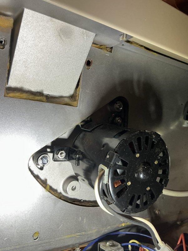 Responded to customer report of unusual noise from furnace while unit remained operational. Upon inspection, diagnosed failing inducer motor assembly exhibiting excessive vibration and abnormal sound during operation. Removed defective inducer motor from furnace cabinet and ordered replacement unit from Lennox Madison Heights under purchase order 1308742-001. Documented existing blower motor assembly condition showing normal wear patterns and verified electrical connections remained secure. System temporarily operational pending inducer motor replacement to eliminate noise issue and prevent future failure.