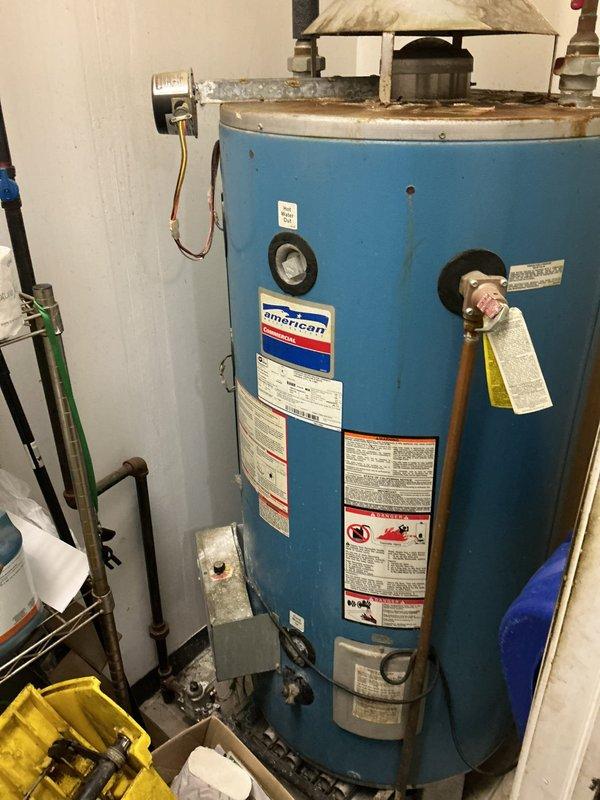 Responded to commercial property for evaluation of inadequate gas line pressure affecting building operations. Upon inspection, assessed the existing natural gas meter installation, pressure regulator assembly, and distribution piping system mounted on exterior wall. Evaluated gas supply capacity and pressure delivery to connected appliances, including water heating equipment. Documented current gas meter configuration, shut-off valve locations, pressure regulation components, and piping infrastructure to determine system deficiencies and develop recommendations for upgrading gas line capacity to meet facility demand requirements.