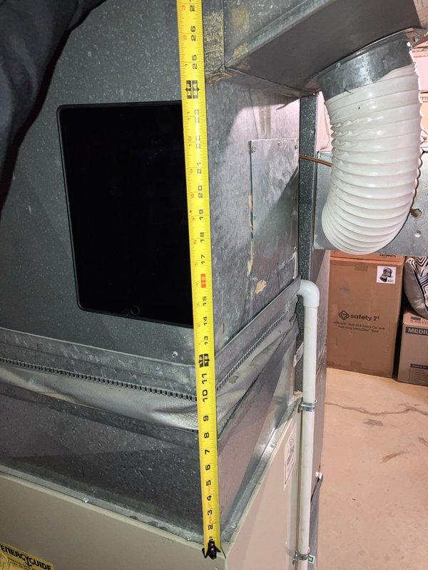 Provided estimate for furnace replacement in basement location. Current 28-year-old unit is operational but nearing end of service life. Assessed existing HVAC air handler configuration, measured equipment dimensions for proper replacement sizing, and evaluated current White-Rodgers thermostat compatibility with new system.