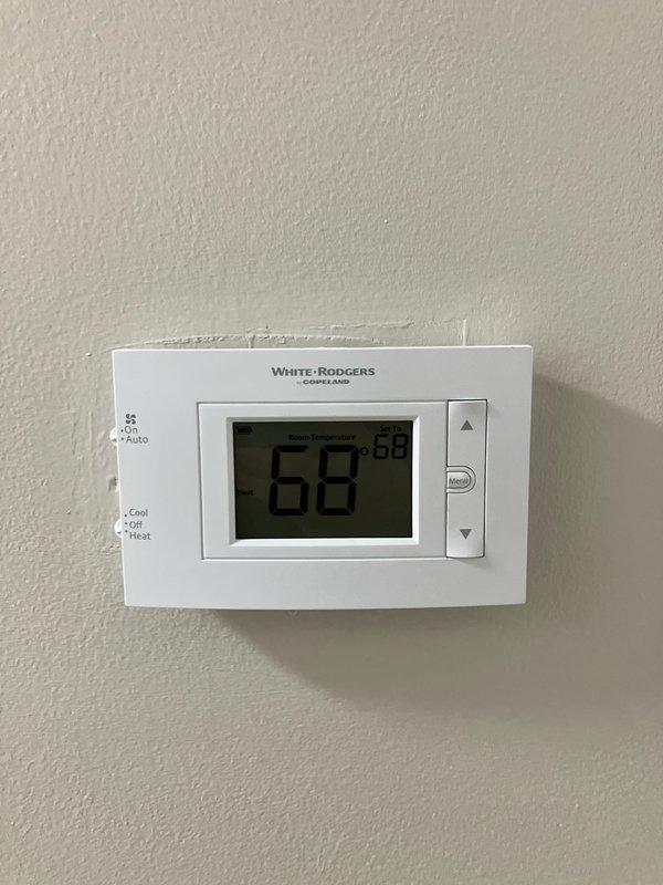 Provided estimate for furnace replacement in basement location. Current 28-year-old unit is operational but nearing end of service life. Assessed existing HVAC air handler configuration, measured equipment dimensions for proper replacement sizing, and evaluated current White-Rodgers thermostat compatibility with new system.