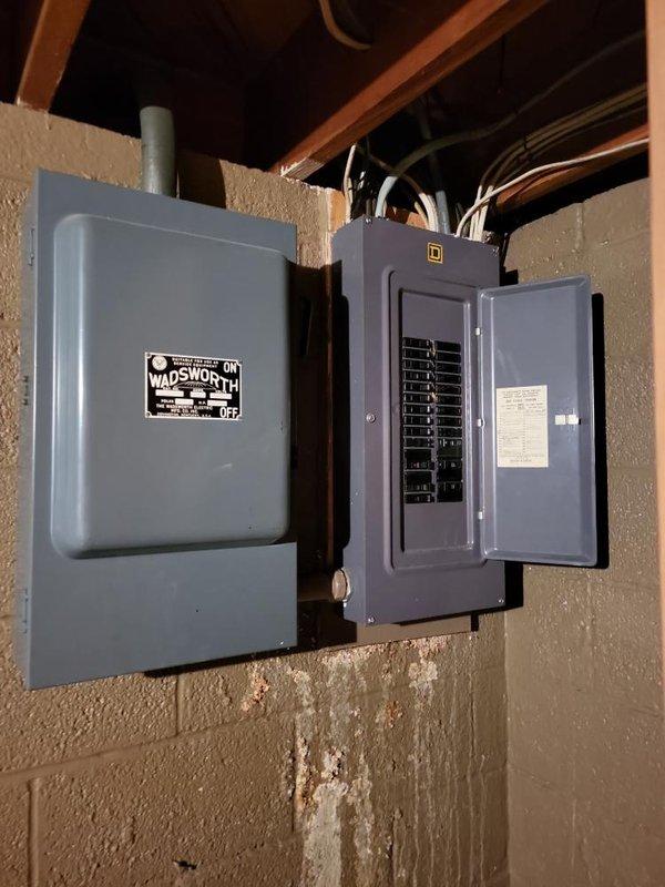 Performed comprehensive furnace and air conditioning system inspection on basement-located equipment. Evaluated 16-year-old AC unit with identified refrigerant leak, melted disconnect wiring, and failed contactor requiring immediate attention. Conducted thorough assessment of system sizing to address homeowner concerns regarding potential undersized equipment, inspected Lennox furnace with integrated humidifier system, verified thermostat operation, examined electrical panels and circuit protection, and assessed hot water tank condition to provide complete replacement estimate and recommendations.