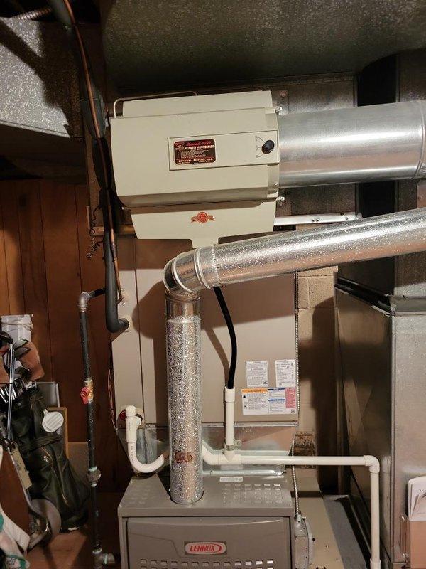 Performed comprehensive furnace and air conditioning system inspection on basement-located equipment. Evaluated 16-year-old AC unit with identified refrigerant leak, melted disconnect wiring, and failed contactor requiring immediate attention. Conducted thorough assessment of system sizing to address homeowner concerns regarding potential undersized equipment, inspected Lennox furnace with integrated humidifier system, verified thermostat operation, examined electrical panels and circuit protection, and assessed hot water tank condition to provide complete replacement estimate and recommendations.