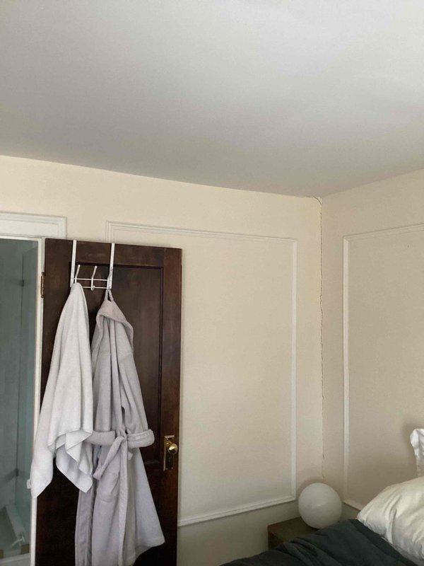 Conducted on-site assessment for mini split installation in a 1923 residential home requiring three indoor units. Evaluated interior bedroom space and exterior brick wall conditions to determine optimal placement for indoor air handlers and outdoor condenser units. Documented mounting locations, electrical routing pathways along existing conduit runs, and clearance requirements for equipment installation on the historic brick structure.