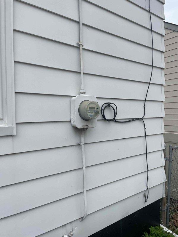 Provided comprehensive estimate for replacement of 30-year-old air conditioning system with existing equipment located in basement alongside natural gas furnace. Current AC unit is operational but has reached end of expected service life. Assessed existing installation configuration, electrical service capacity at meter location, and basement mechanical room layout to determine appropriate replacement equipment specifications and installation requirements.