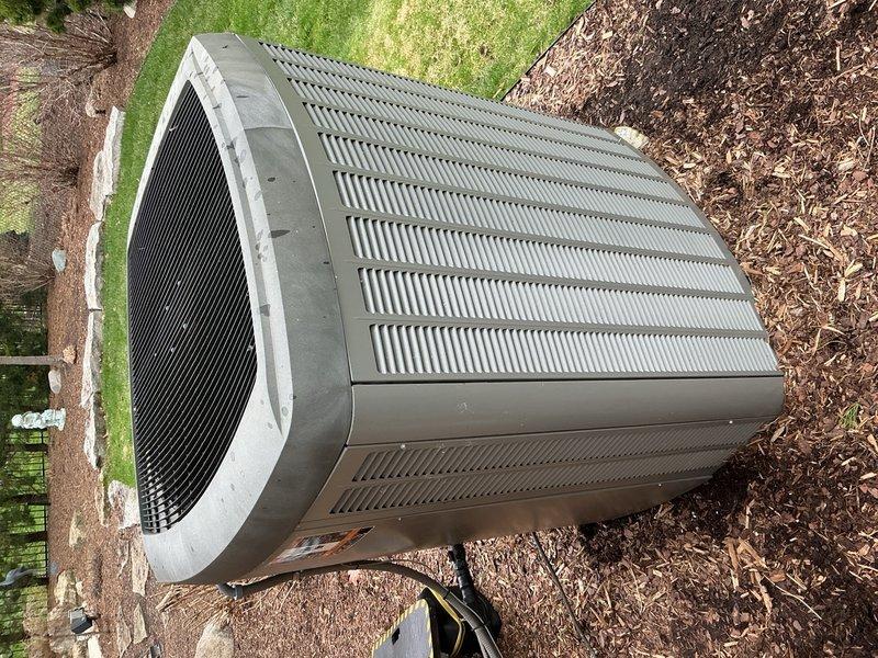 Completed comprehensive Gold AC inspection on a 10+ year old single-unit residential air conditioning system with air handler located in basement. Performed thorough visual and operational assessment of outdoor condenser unit, confirming proper fan operation and adequate airflow through louvered panels. Inspected electrical control panel and internal components including circuit boards, capacitor (45/5 MFD), transformers, relay boards, and control modules. Verified all electrical connections, wiring integrity, and proper component function. System operational and performing within normal parameters at time of inspection.