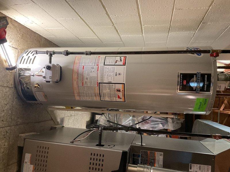 Responded to no hot water complaint on 6-year-old, 40-gallon electric water heater in basement. Upon inspection, diagnosed failed upper heating element preventing water from heating. Replaced defective upper heating element, tested both elements for proper operation, verified thermostat functionality, and restored full hot water production. Unit returned to normal operating condition with adequate hot water delivery throughout the home.