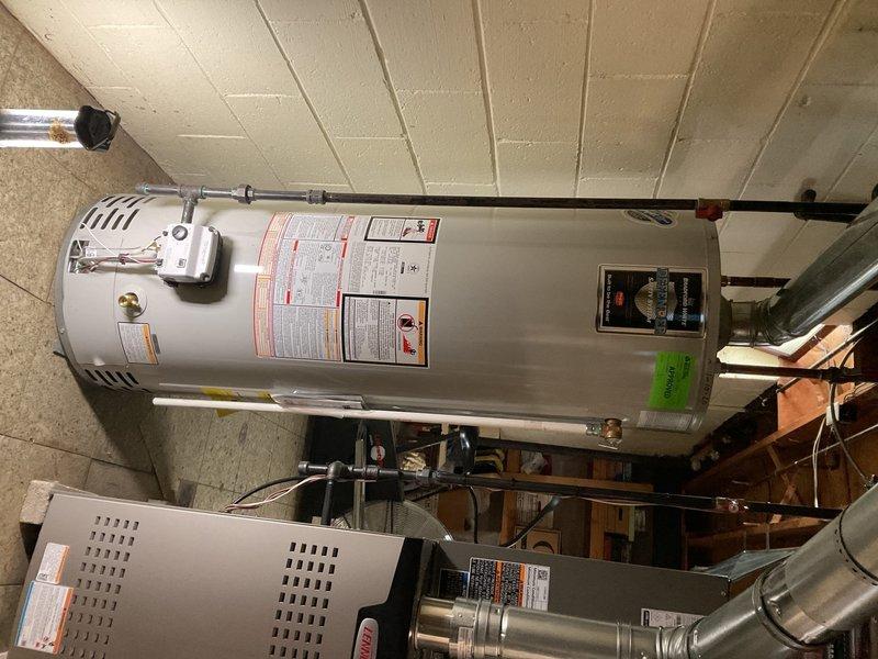 Responded to no hot water complaint on 6-year-old, 40-gallon electric water heater in basement. Upon inspection, diagnosed failed upper heating element preventing water from heating. Replaced defective upper heating element, tested both elements for proper operation, verified thermostat functionality, and restored full hot water production. Unit returned to normal operating condition with adequate hot water delivery throughout the home.