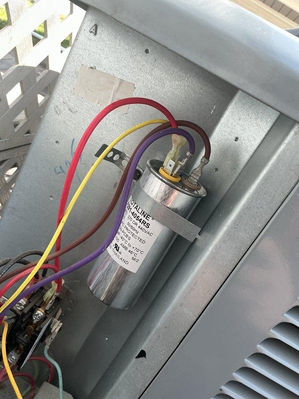 Completed comprehensive Gold AC inspection on 6-year-old residential air conditioning system with air handler located in utility/back of house area. Performed full system evaluation including electrical component inspection, verified capacitor connections and contactor operation, checked all wiring terminations for proper connections and secure mounting. Inspected disconnect switch operation, confirmed proper electrical supply to unit, and examined blower motor assembly. Verified condensate drain line routing and functionality. All electrical components including capacitor, contactor, and control wiring found in good operational condition with proper connections. System operating as designed with no deficiencies noted during inspection.