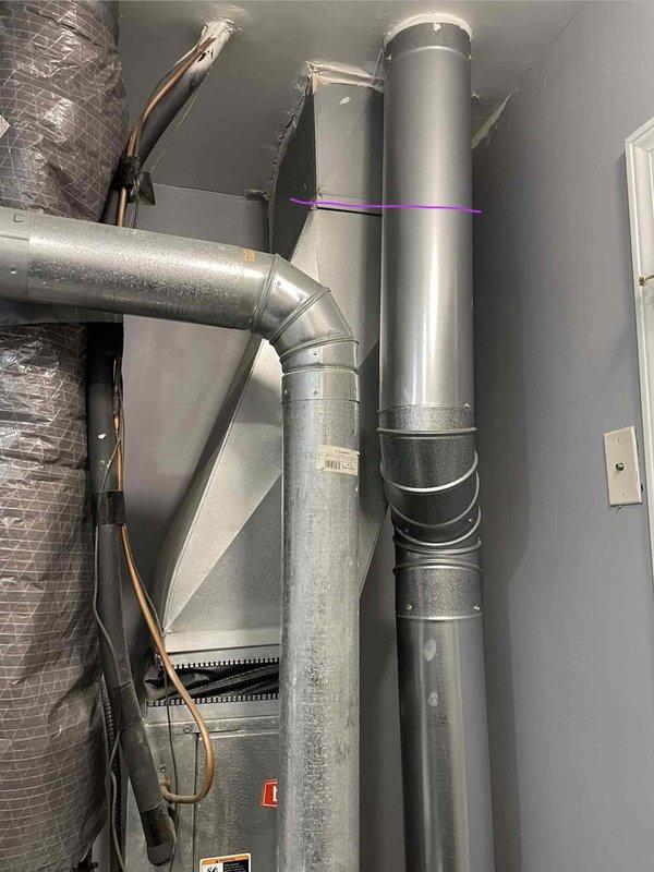 Completed comprehensive HVAC system estimate for full equipment replacement in residential utility space. Assessed existing installation including air handler unit, ductwork configuration with flexible and rigid metallic components, refrigerant line routing, and integration with water heating equipment. Documented current system layout, duct transitions, elbow connections, and mechanical room infrastructure to provide accurate replacement specifications and installation requirements.