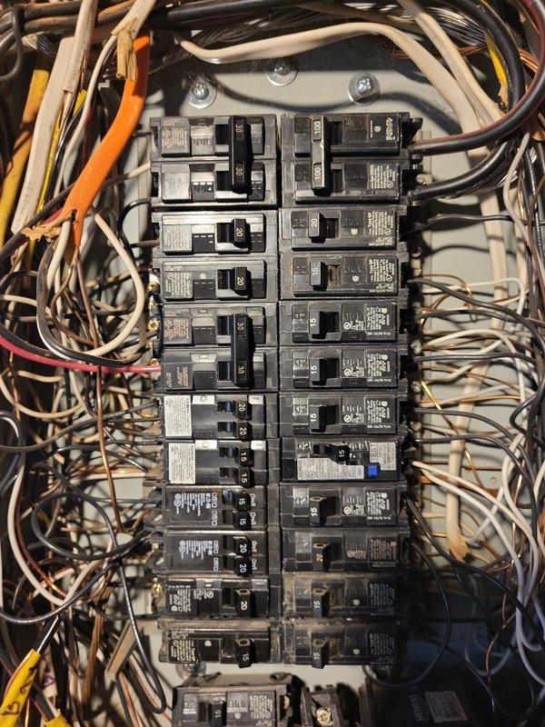 Provided estimate for new generator installation at residential property. Evaluated existing electrical panel infrastructure and circuit distribution to determine integration requirements for standby generator system. Documented current breaker panel configuration showing multiple circuits including main breaker, furnace, kitchen appliances, lighting circuits, fire system, and other essential loads to assess transfer switch specifications and generator capacity needs for backup power coverage.