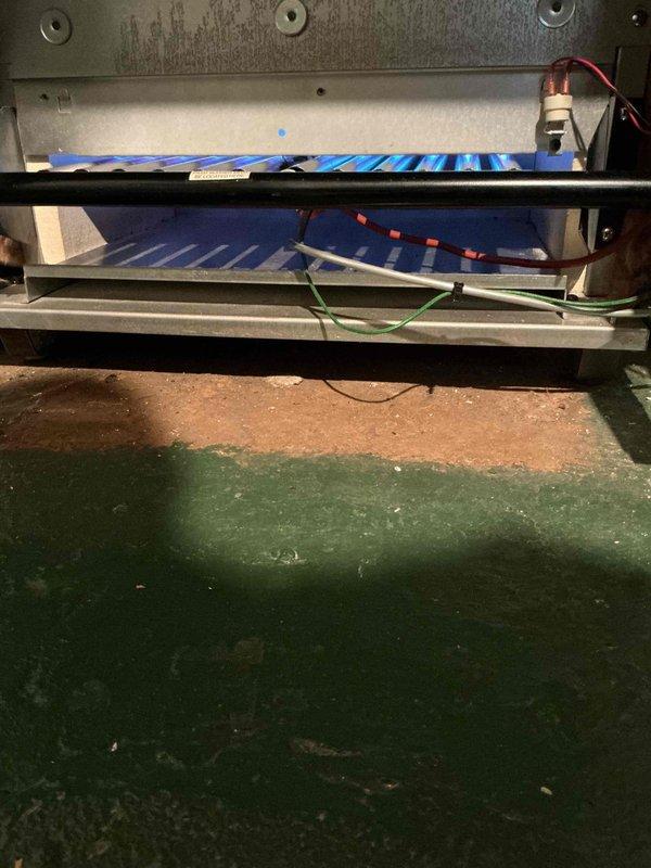 Completed comprehensive boiler inspection at basement location. Performed combustion analysis using digital diagnostic meter, recording oxygen levels at 20.8%, carbon monoxide at 0 ppm, pressure at 0.04, and flue temperature at 32.9°F. Inspected internal heat exchanger components, evaporator coils, and electrical connections including capacitor and wiring harness; all components found to be in operational condition with no immediate safety concerns identified.