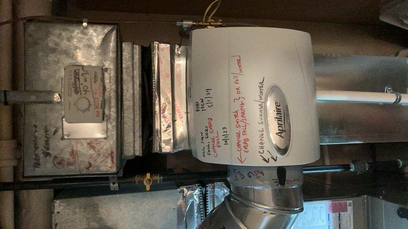 Completed comprehensive tune-up on 10-year-old air conditioning system in basement location. Performed standard maintenance procedures including inspection of condensing unit, evaporator coil, refrigerant levels, electrical connections, and ductwork connections. Verified Aprilaire humidifier integration with HVAC system and confirmed proper operation of all components; system operating within normal parameters with no deficiencies noted at time of service.