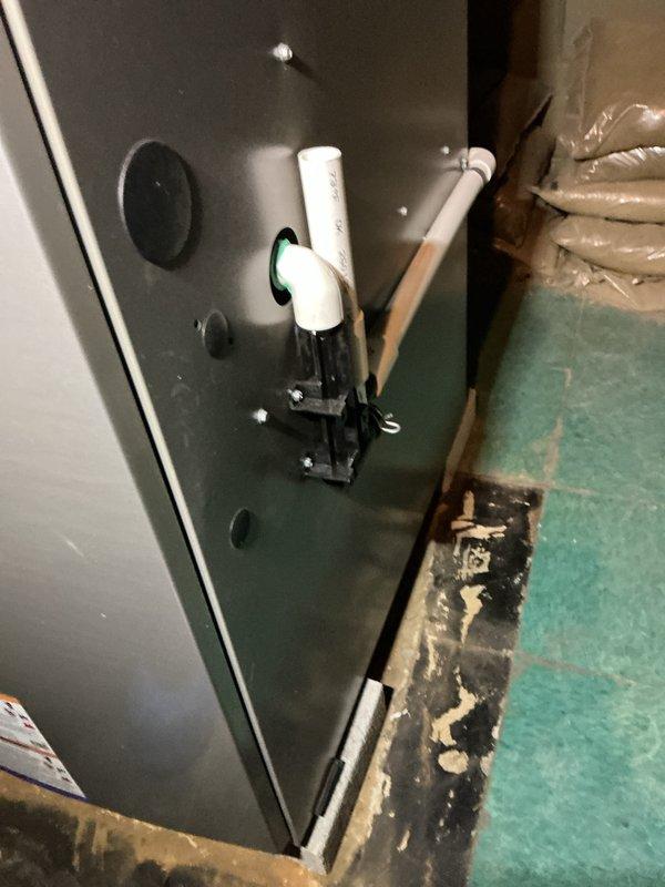 Performed system start-up on newly installed air conditioning system, including basement evaporator coil and outdoor condensing unit. Verified proper operation of all components, confirmed refrigerant lines and condensate drainage were functioning correctly, and documented equipment installation with photos showing both indoor and outdoor units in operational condition.