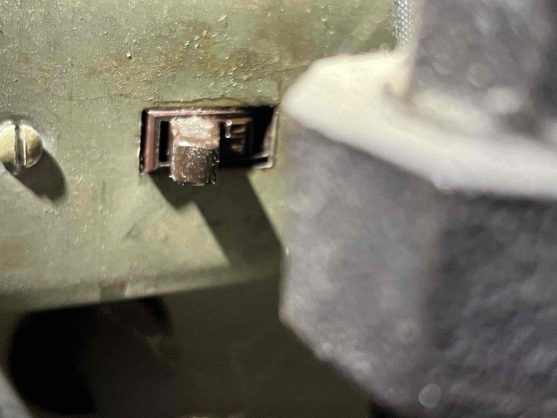 Responded to no heat call on 20+ year old furnace in utility room with symptom of unit turning on then shutting off after approximately one minute of operation. Performed diagnostic evaluation and inspected control board circuitry, identifying failed relay component on main circuit board causing premature safety shutdown. Inspected furnace cabinet access latch and overall unit condition during troubleshooting process. Recommended control board replacement due to age of equipment and component failure to restore reliable heating operation.