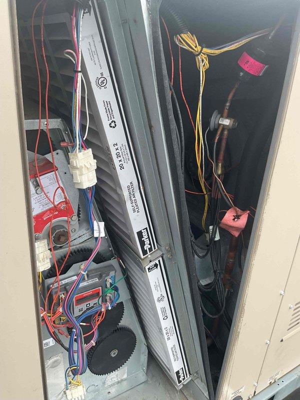 Performed scheduled commercial HVAC maintenance on rooftop RTU unit per service agreement. Accessed unit with ladder, inspected internal components including wiring, capacitors, and air handler assembly, documented equipment condition with photos. Coordinated filter replacement with facility to be completed under existing purchase order.