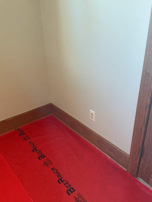 Responded to plumbing repair request and performed inspection of exposed copper water supply lines. Identified aging NIBCO copper piping with visible oxidation and verdigris formation at connection points, indicating potential deterioration of pipe integrity. Assessed insulation wrapping around pipes, which showed significant degradation and moisture damage. Completed necessary repairs to copper supply lines, replacing compromised fittings and sections as needed. Installed new pipe insulation to prevent condensation and maintain proper temperature control. Protected work area with appropriate floor covering during repair process. Verified all connections for proper seal and tested system for leaks. Restored wall cavity and cleaned work area upon completion.