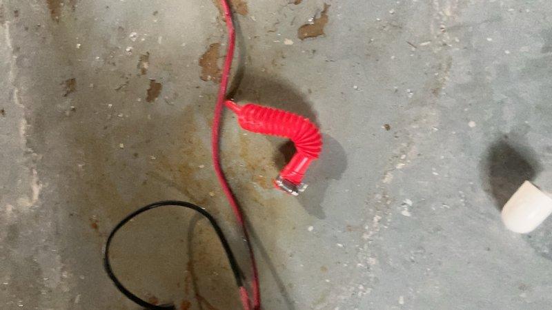 Responded to service call for water leakage on 3-year-old furnace unit in basement. Upon inspection, identified condensate drainage issue causing water accumulation on concrete floor beneath unit. Documented staining and moisture damage on equipment casing and surrounding floor area. Inspected internal components including control board, wiring harnesses, and condensate management system to determine source of leak. Cleared condensate drain line obstruction and verified proper drainage flow. Tested unit operation and confirmed leak resolved with no further water discharge to floor.