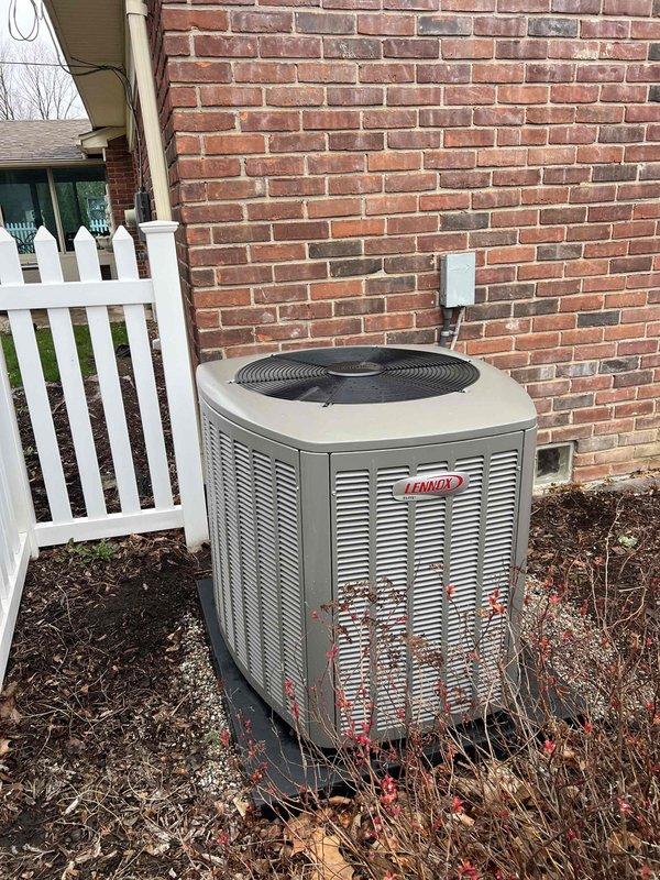 Completed air conditioning system start-up and inspection on residential split system with Lennox outdoor condensing unit and basement evaporator coil. Verified proper system operation, checked electrical connections, inspected refrigerant lines and drainage, and documented equipment condition with photographs for service records.