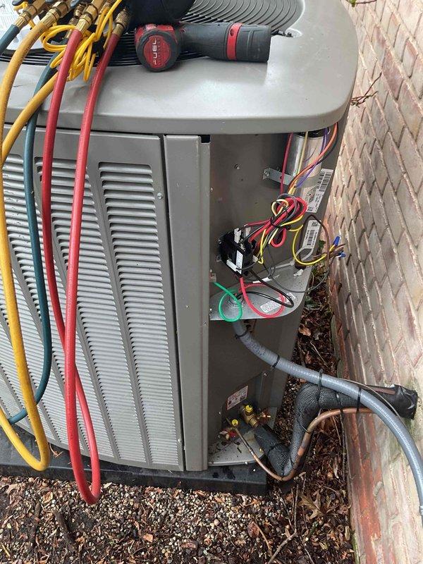 Performed system start-up and commissioning on newly installed Lennox air conditioning system with basement evaporator coil. Connected and tested refrigerant lines, verified electrical connections at outdoor condensing unit, and confirmed proper operation of all components including compressor, fan motor, and control board.