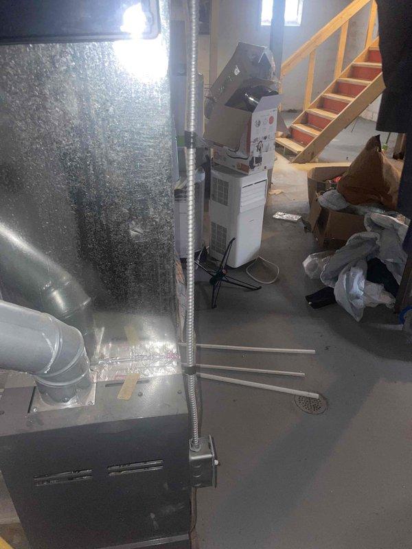 Completed on-site assessment for air conditioning replacement estimate at residential property with basement installation location. Evaluated existing HVAC infrastructure, ductwork configuration, and electrical service capacity to determine requirements for new AC system installation compatible with existing natural gas furnace. Documented current equipment layout, ventilation pathways, and mechanical room conditions to prepare comprehensive replacement proposal.