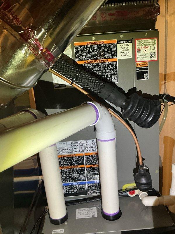 Completed AC startup and inspection on newly installed complete HVAC system including basement evaporator coil and attic air handler unit. Verified proper refrigerant charge, tested all electrical connections, confirmed condensate drainage through PVC drain lines, and ensured system achieved target temperatures and airflow specifications across both zones.