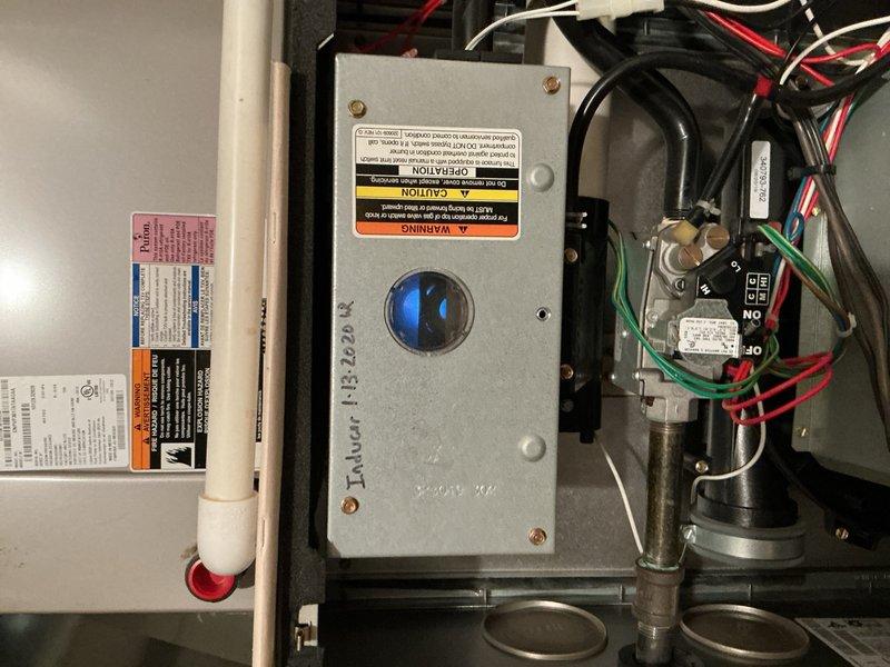 Completed comprehensive furnace tune-up and safety inspection on 10+ year old unit located in basement. Performed thorough examination of gas valve assembly, ignition control module with operational indicator light, electrical connections, and all safety controls. Inspected burner assembly, heat exchanger, blower components, and verified proper operation of all system functions. All components found to be in normal operating condition with no immediate safety concerns identified. System operating within manufacturer specifications.